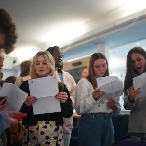 students reading their results