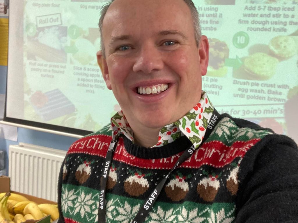 teacher wearing christmas jumper