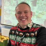 teacher wearing christmas jumper