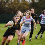 Students playing rugby