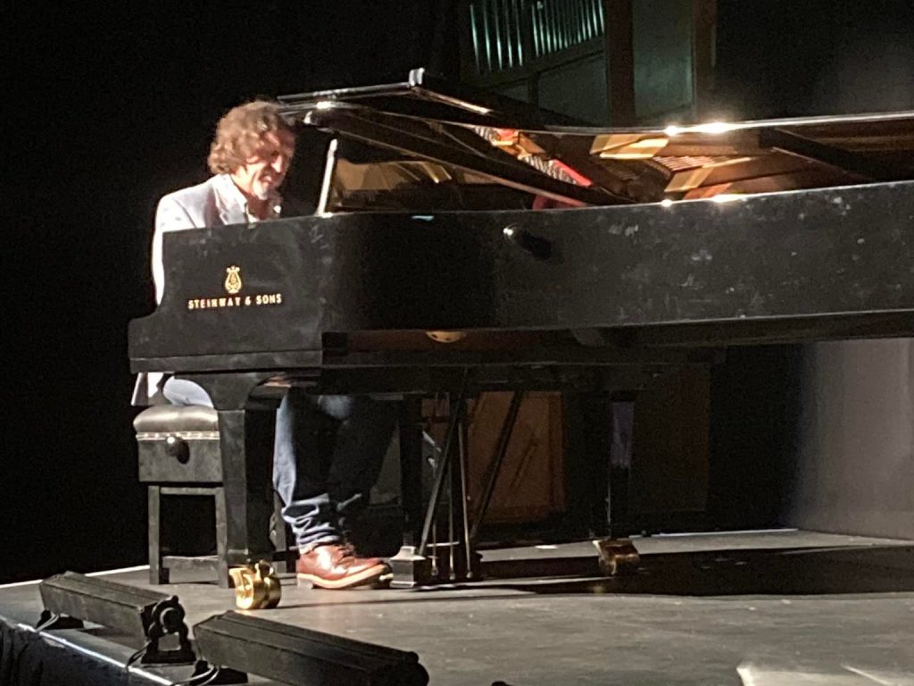 Jay Rayner playing piano
