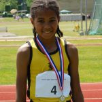 Smiling student with medal