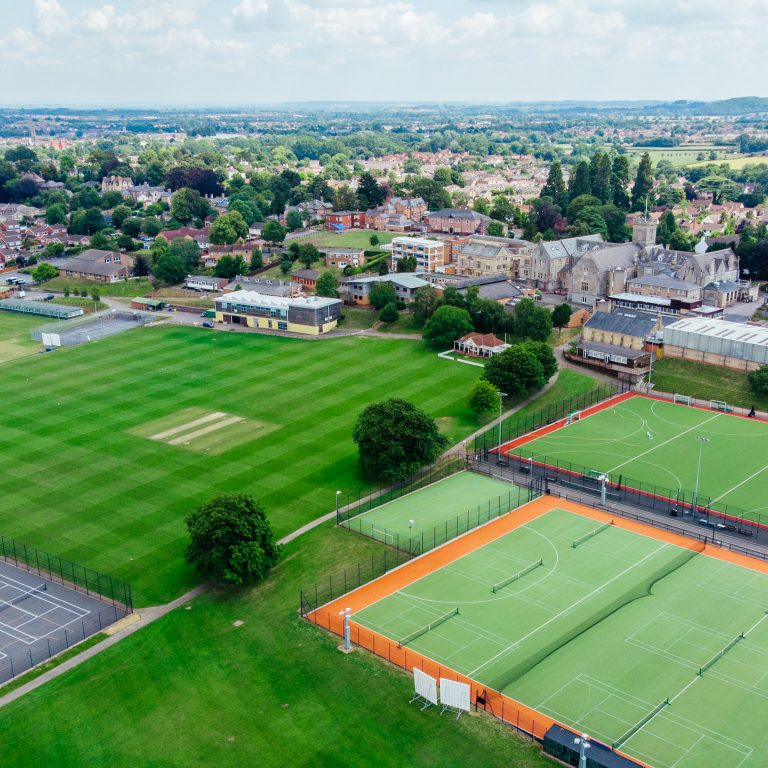 aerial view of pitches and tennis courts