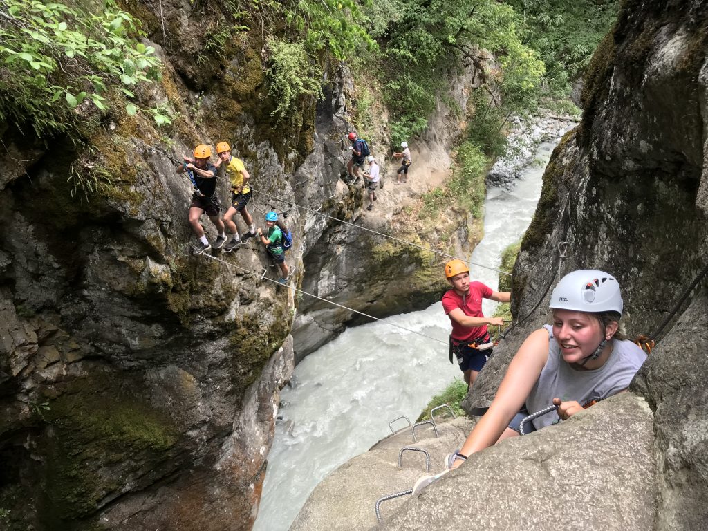 students rock climbing