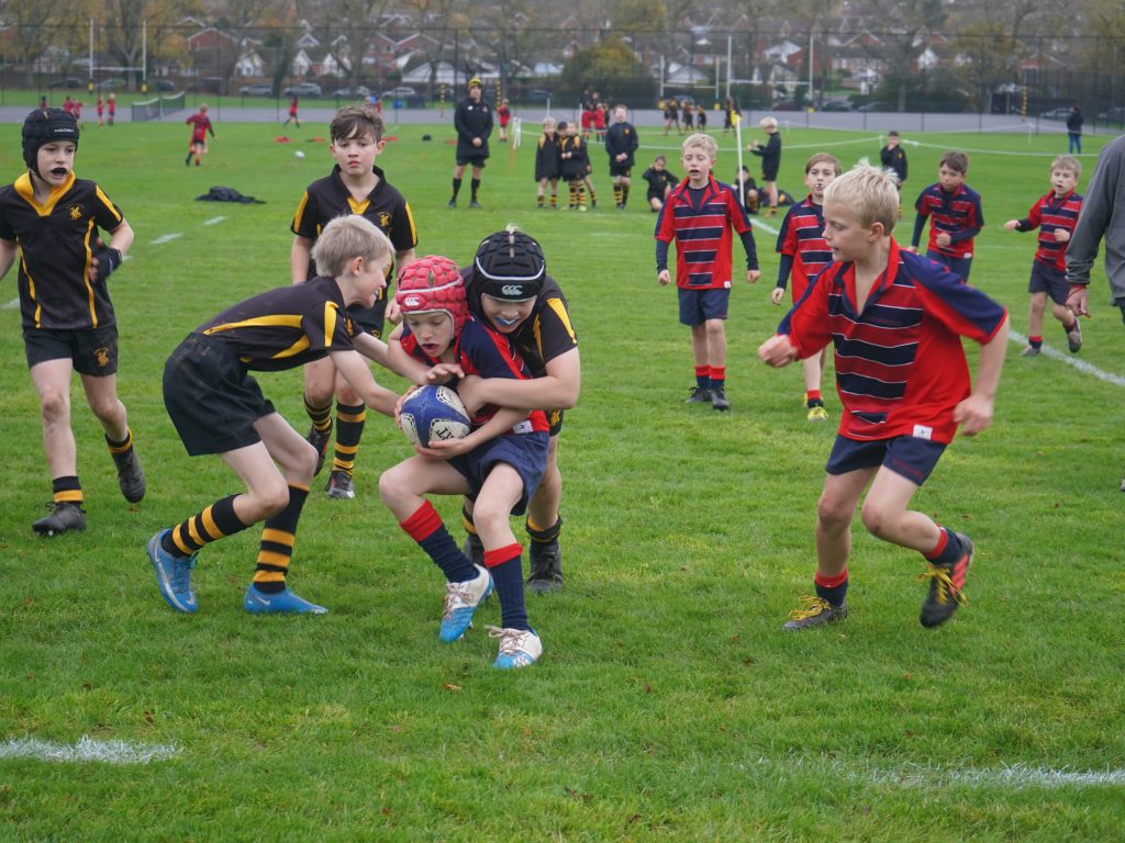 boys on the field playing sports