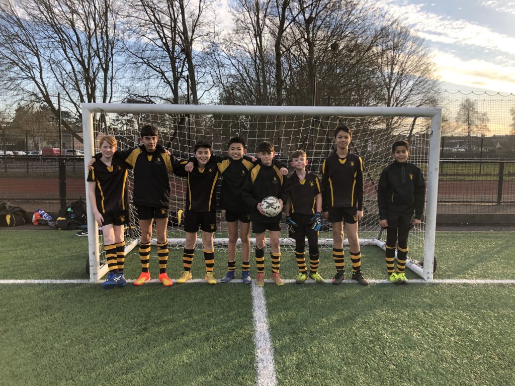 boys in their football kit