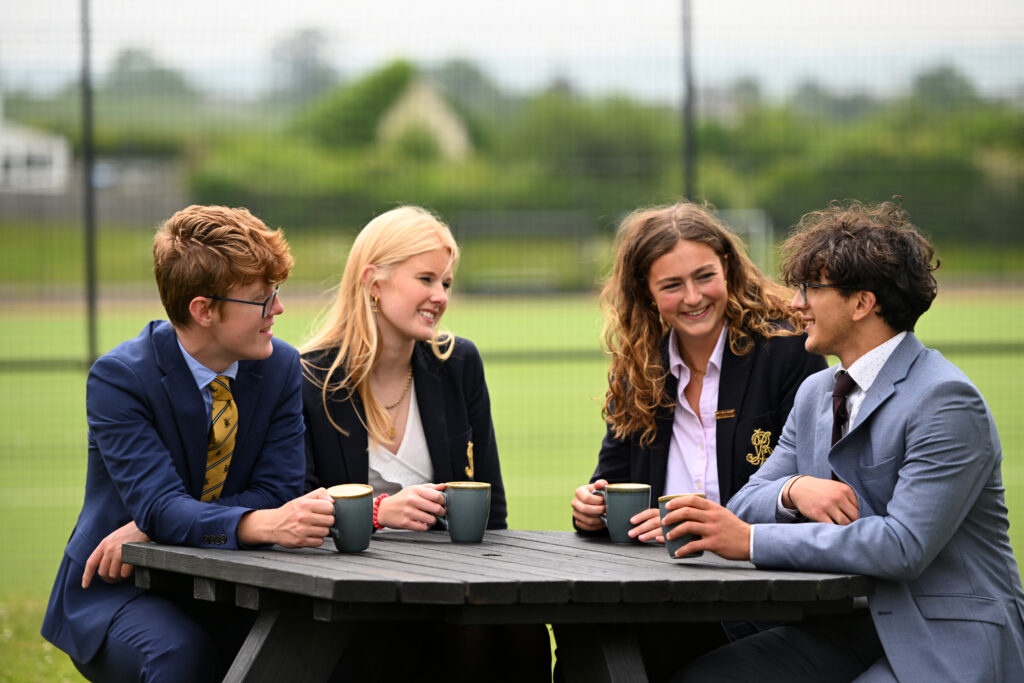 Queen's College Sixth Form pupils