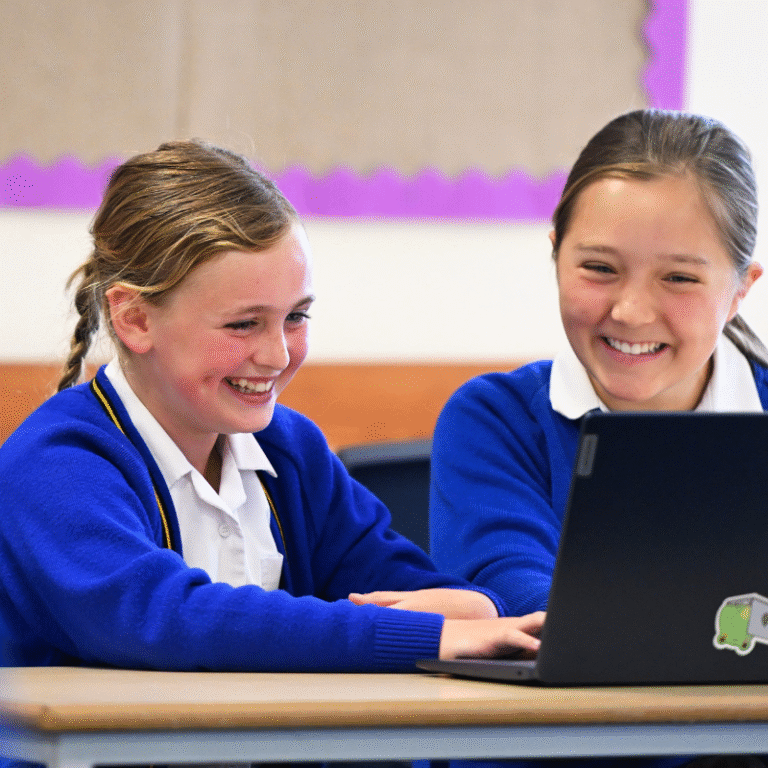 Queen's College Prep pupils in a classroom