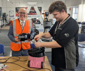 Mr Joe Mann and an employee of Numatics working on a Henry Mr Joe Mann and an employee of Numatics working on a Henry Vacuum.