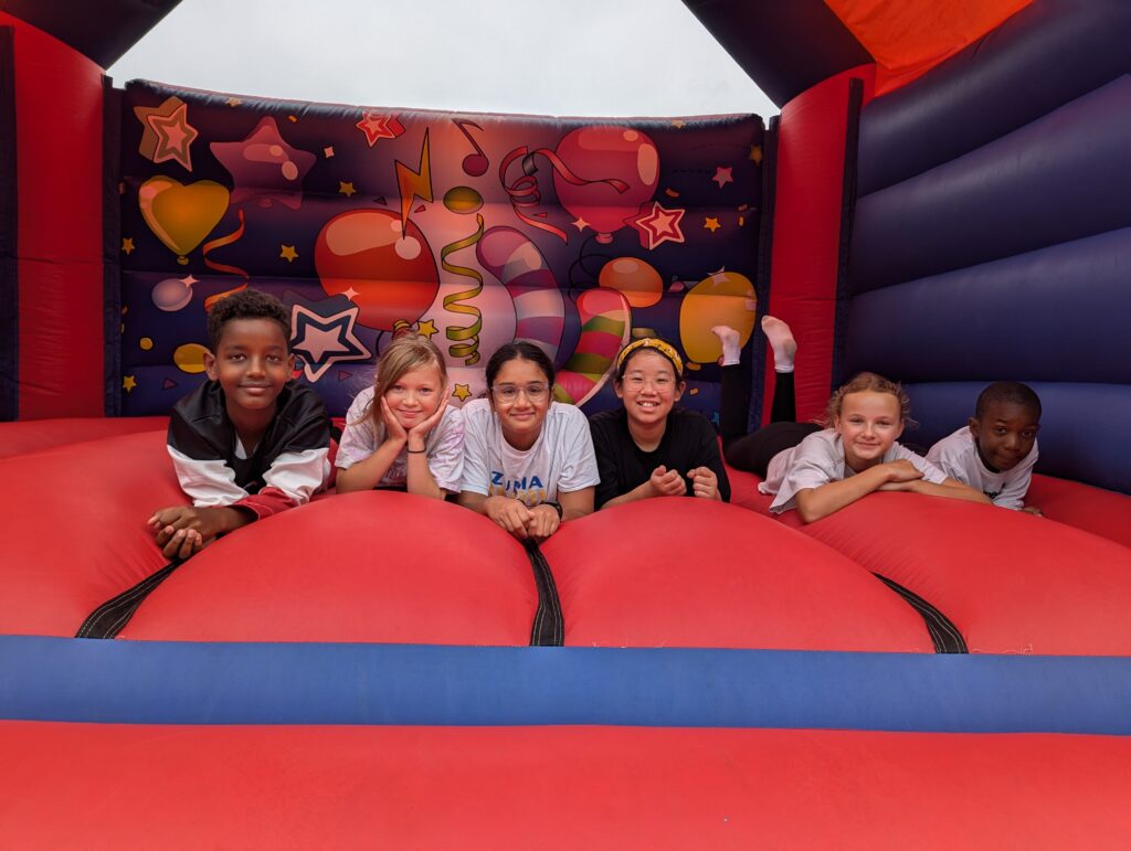 Boarders on a bouncy castle.