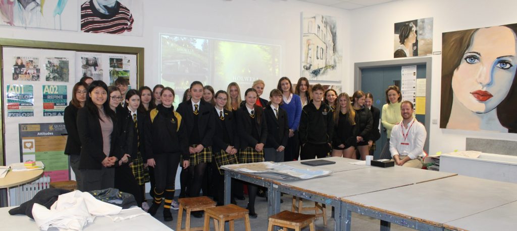 A group picture of Ollie with all the art scholars.